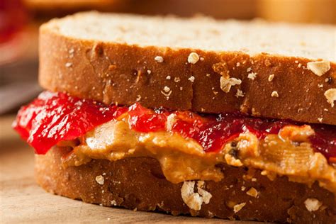 Two Slices of Bread with Peanut Butter and Jelly